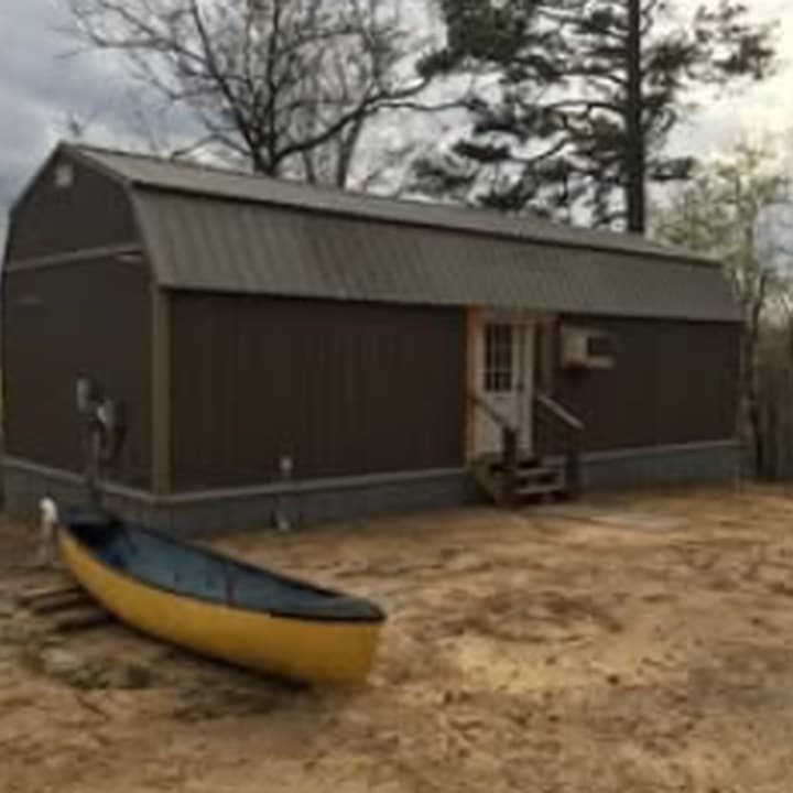 Cabin Three exterior on the hillside